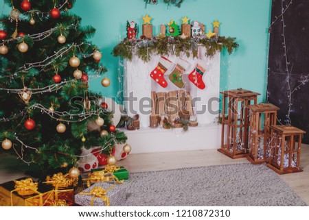 Christmas decoration of fireplace in living room. Suitable for Christmas background. Christmas tree
