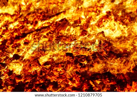 Fire. Volcano incandescent material. Hot charcoal bonfire. Carbon emissions combustion