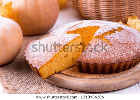 Fresh Homemade Pumpkin Pie on wooden table