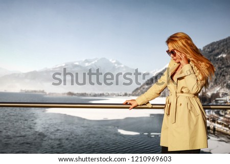 Slim young blond woman and winter time.  