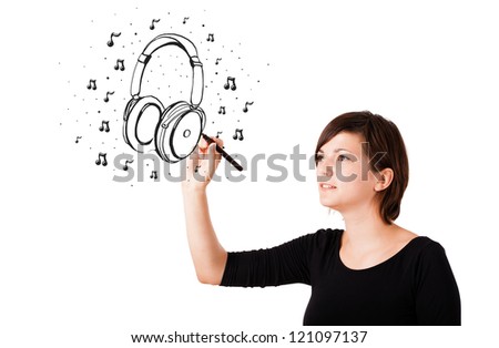 Young girl drawing headphone and musical notes isolated on white