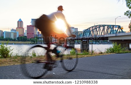 Biker and city of Portland