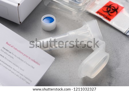 DNA genome saliva consumer genetic ancestry collection kit Royalty-Free Stock Photo #1211032327