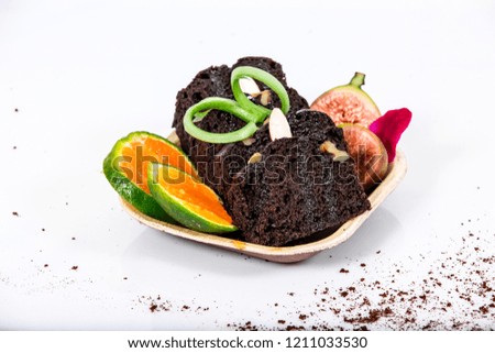 Food photography is a still life photography genre used to create attractive still life photographs of food. It is a specialization of commercial photography, the products of which are used in ads.