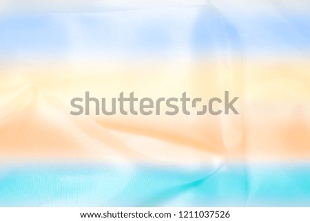 Colorful silk for background. Texture, background, pattern. The fabric is knitted blue, turquoise, blue. I will add a creative approach to your next project. With this fabric.