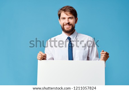  a man in a shirt and tie holds a white sheet of paper in his hand  mockup, poster                              