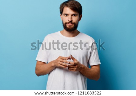 man with a glass of pure health                           