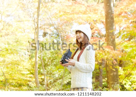 Asian woman taking the picture