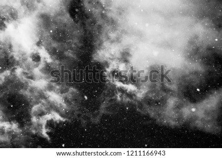 snowing sky with light clouds in black and white