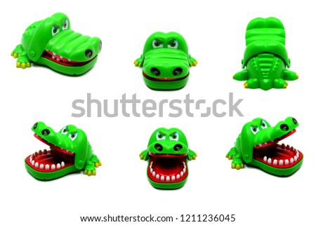Crocodile plastic toy (bite game)   isolated on white background. 