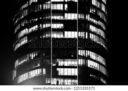 Modern office building at night. Black and white