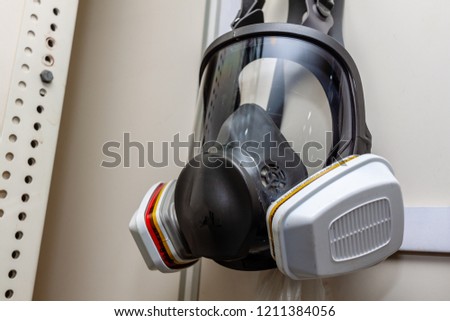 Full face mask multi-purpose respirator with cartridge for breathing in abnomal air or toxic gas in environmental Royalty-Free Stock Photo #1211384056