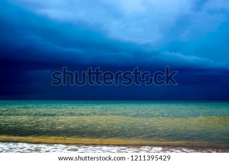  landscape azure emerald sea waves under a dramatic stormy sky                              