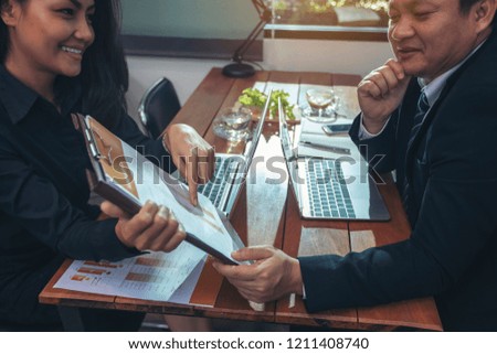Businessman working with finance are analyzing the information to make investment decisions, with experienced business consultants. business analysis, and strategic ideas. Royalty-Free Stock Photo #1211408740