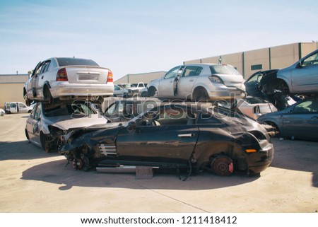 A graveyard of cars, broken cars sell on spare parts.	
