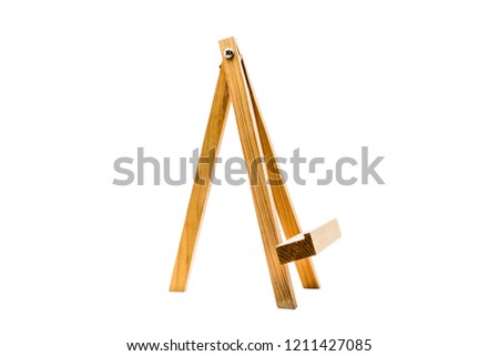 Wooden easel on white background