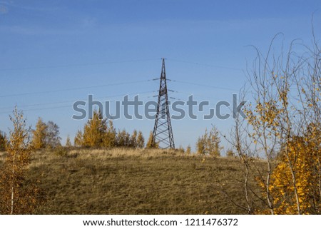 Power line. Power line on the background of the autumn landscape. Copy space.