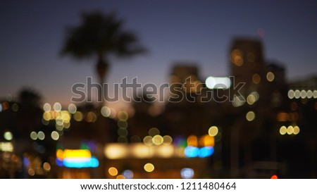 Blurry background plate of downtown city skyline in California city at night