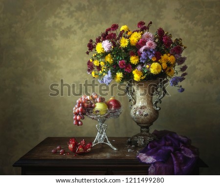 Still life with bouquet of autumn colorful chrysanthemums