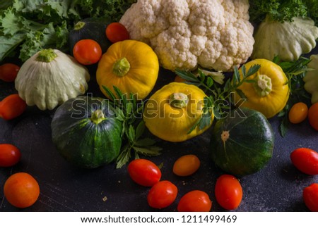 Beautiful picture of vegetables. squash, cauliflower, cherry tomatoes and broccoli .Natural texture of vegetables.