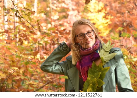 A girl in a beautiful autumn forest