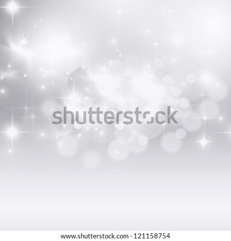 Light silver abstract Christmas background with white snowflakes