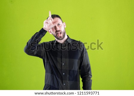 Guy making loser sign