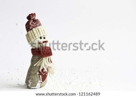 Cute snowman over white background with Snow