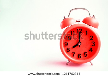 Alarm clock isolated on gray background with copy space