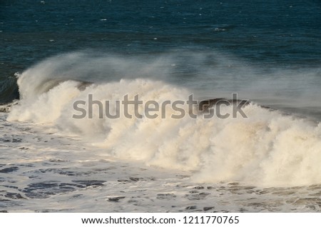 waves crashing on beach, digital photo picture as a background