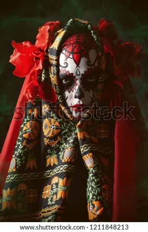 A close-up portrait of Calavera Catrina. Sugar skull makeup. Dia de los muertos. Day of The Dead. Halloween.