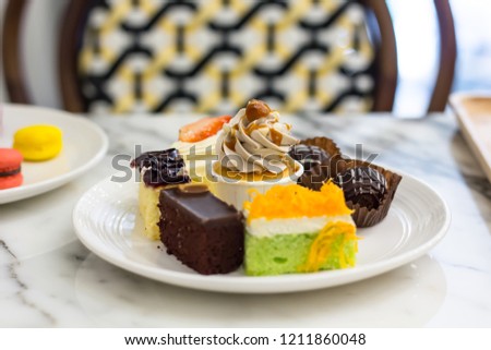 Colorful of Cakes on white plate, Dessert Party