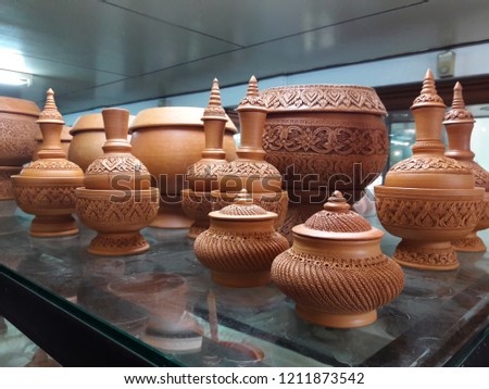 Thai earthenware handmade,carved pots.