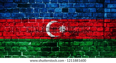 National flag of Azerbaijan on a brick background. Concept image for Azerbaijan: language , people and culture.
