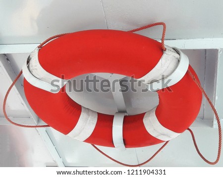 Rubber Lifejacket with Red and White.