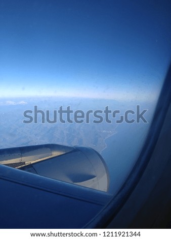 The view from the window of the plane, the flight over Russia