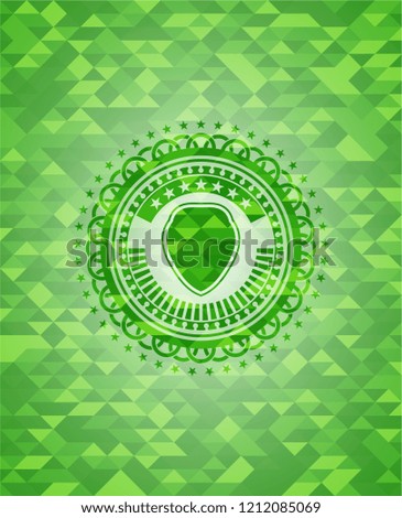 shield icon inside realistic green mosaic emblem