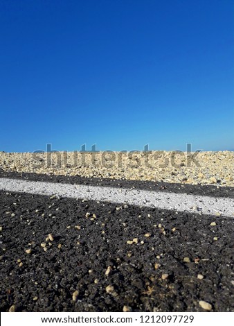 The biggest horizon about asphalt and sky.