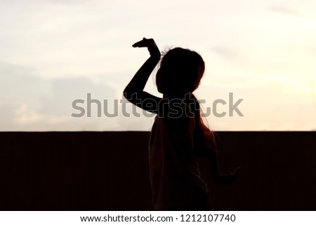 silhouette children over sunrise, shadow image of children in happy playing feel evening time, silhouette picture of child playing enjoy, kid joy playing silhouette feel in sky sunset