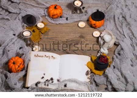 Halloween Party Tips. Opened book of bewithcment.Overhead perspective. Free space for a text.