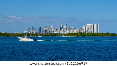 Boat ride in front of Miami skyline