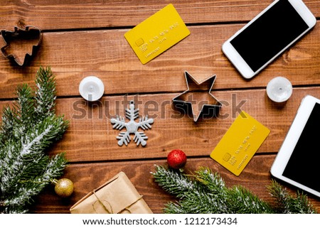 Online shopping for new year on wooden table top view