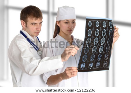doctor and nurse studies picture in hospital