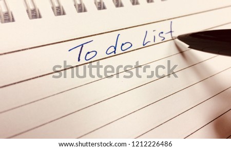 someone writing words To Do List by hand