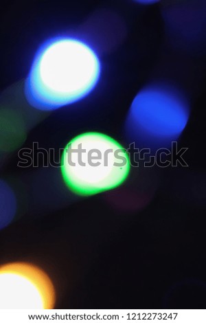 A soft glowing colourful orb lights overlay/texture/mask design.