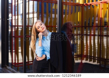 Modern young woman in a big city