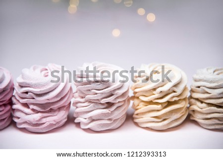 Marshmallow on bokeh lights background. pastel colors