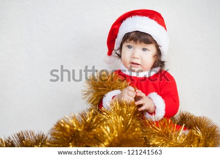 Christmas happy baby in Santa hat