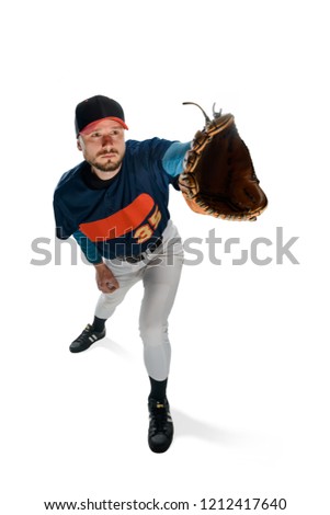 Player trying to catch a ball. Good-looking young man playing baseball as a pitcher. Half length portrait on white.