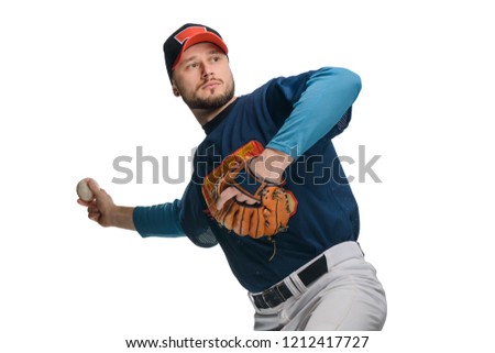 Baseball player in a stride, making a swing to throw a knuckleball. American team games, leisure and hobby.